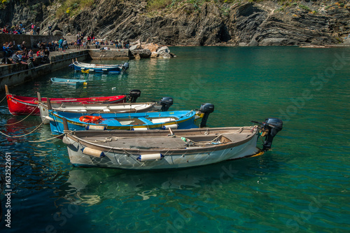 Fishing boats with buoys moored in the bay, Mediterranean flavor