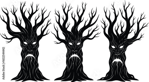 Three spooky anthropomorphic trees in silhouette