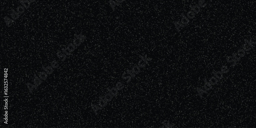 Dark charcoal granite texture represents a surface with countless small dark specks ideal for design projects related to stone and building materials