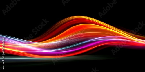 Vibrant abstract light trails in bold colors on a dark background.