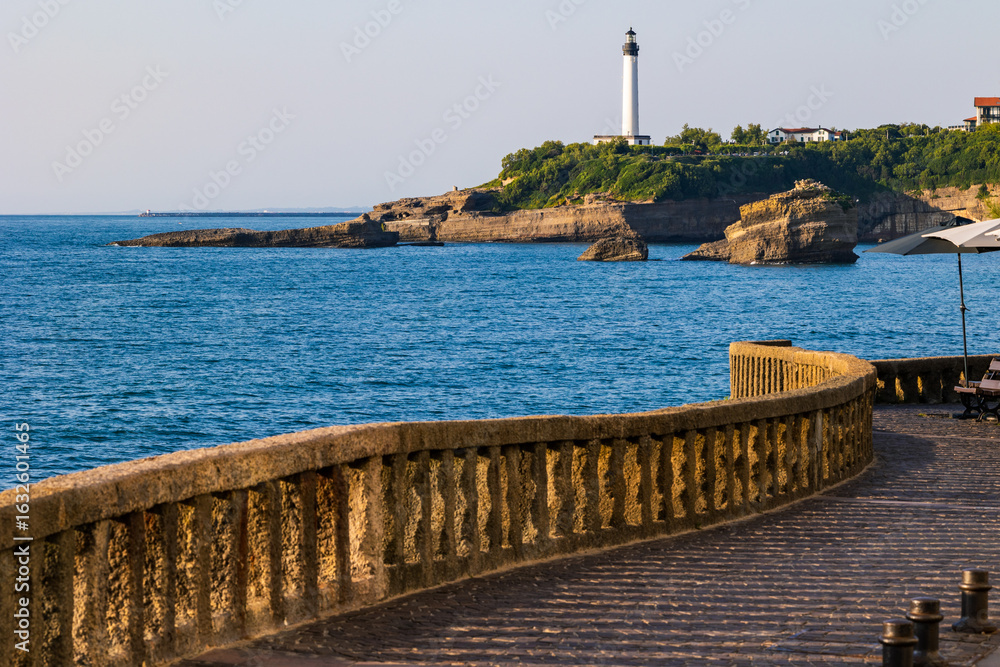 Obraz premium Lighthouse at Pointe Saint-Martin Seen from the Rocher du Basta in Biarritz