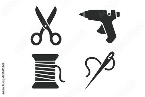 Vintage sewing tool icons set. Solid black vector illustrations of fabric scissors, glue gun, thread spool and sewing needle. Classic retro silhouette symbols for crafting, tailoring, DIY projects