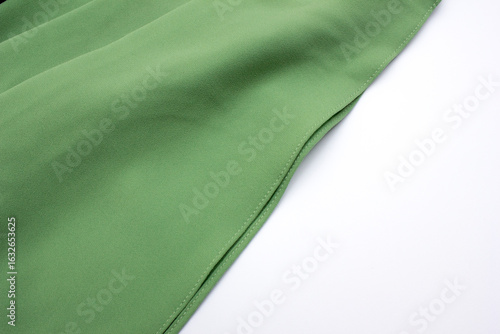 Wallpaper Mural Abstract wavy green silk fabric with glossy folds, elegant background for design. Torontodigital.ca