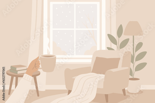 Cozy winter morning with hot beverage and a view of falling snow outside a comfortable living room