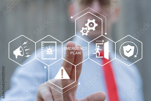 Concept of emergency response plan. Business person using virtual touch screen push the inscription: EMERGENCY PLAN. Learn and prepare in emergency situation. Emergency Preparedness Training.