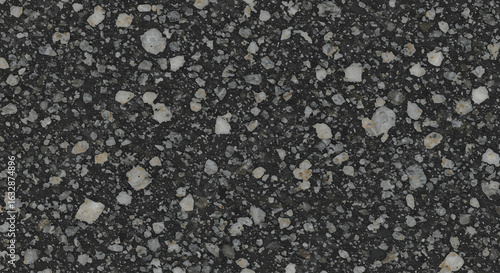 Detailed close-up showcases the rugged texture and contrasting colors of a dark granite surface.