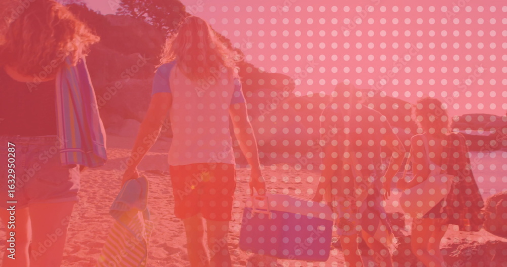 Naklejka premium Walking five friends carrying beach gear along sandy shoreline by cliffs, with blue portable cooler