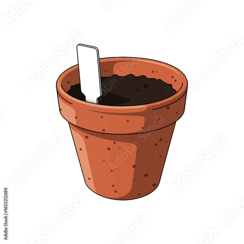 A terracotta pot filled with dark soil, ready for planting, marked with a small white label.
