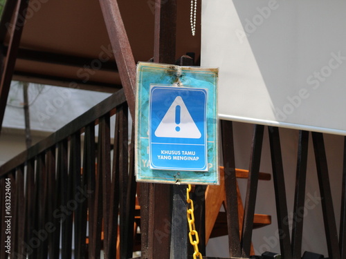 warning sign for overnight guest