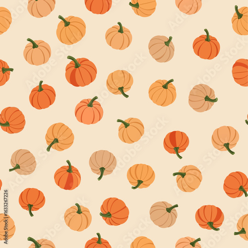 Seamless repeat pattern featuring many cartoon-style pumpkins in various shades of orange and tan, scattered on a light beige background.