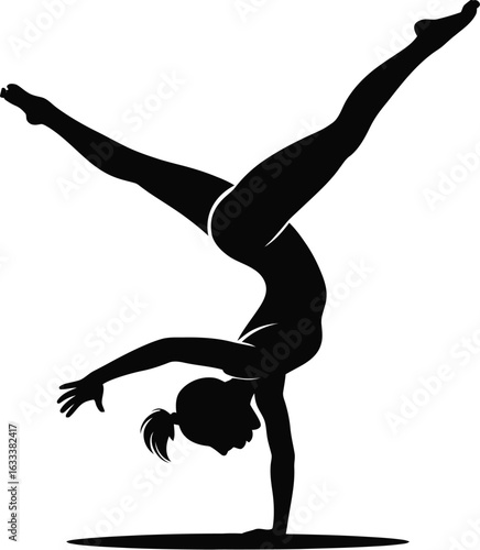 Silhouette of gymnast performing a handstand athletic