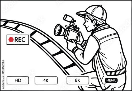 Young man filming with professional camera on a dolly track capturing high definition footage with 4k and 8k options available