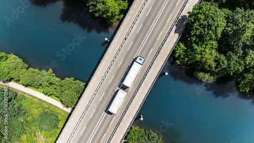 Bridge over canal with truck aerial drone view, dutch landscape, transportation concept, the Netherlands