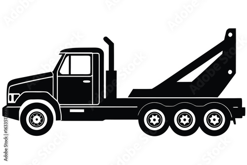Black Silhouette of Tow Truck with Three Axles and a Large Boom Arm