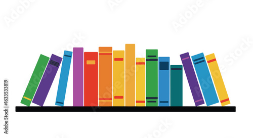 Row of colorful books standing on a shelf, leaning slightly