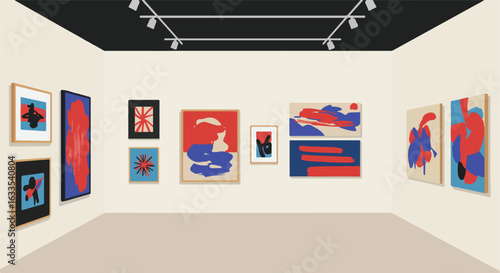Art gallery with red and blue abstract paintings under track lighting