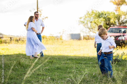 Relaxed family of four on regional New South Wales farm