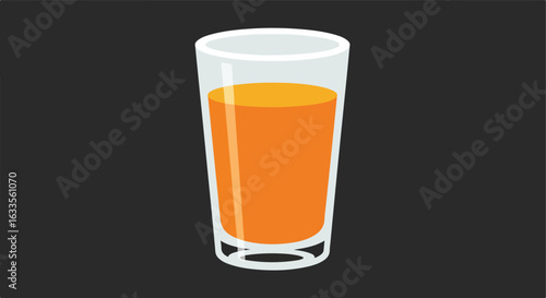 Tall glass filled with orange liquid over a dark background