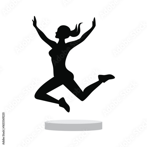 Silhouette of a joyful woman mid-leap on a pedestal