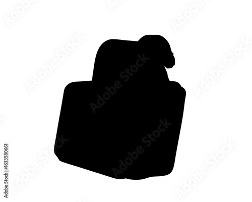 Silhouette of a plush toy sitting in a child's armchair
