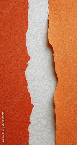 Torn paper strips in orange and white