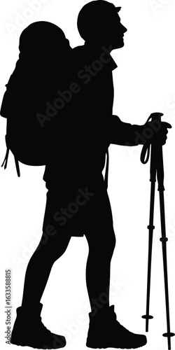Hiker with backpack and trekking poles walking silhouette