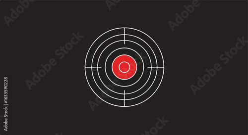 White concentric target with a red center on a black background