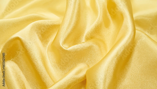 Minimalist Yellow Silk Fabric Draped Background with Soft Lighting for Elegant Product Display