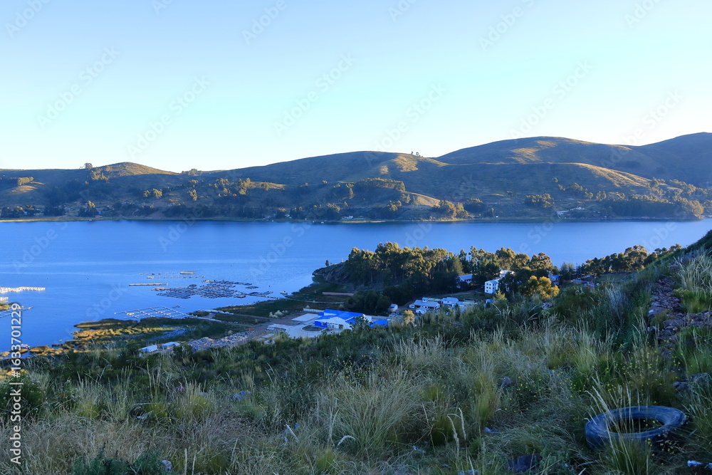 Fototapeta premium A peaceful view of Lake Titicaca from a hill near San Pablo de Tiquina, Bolivia