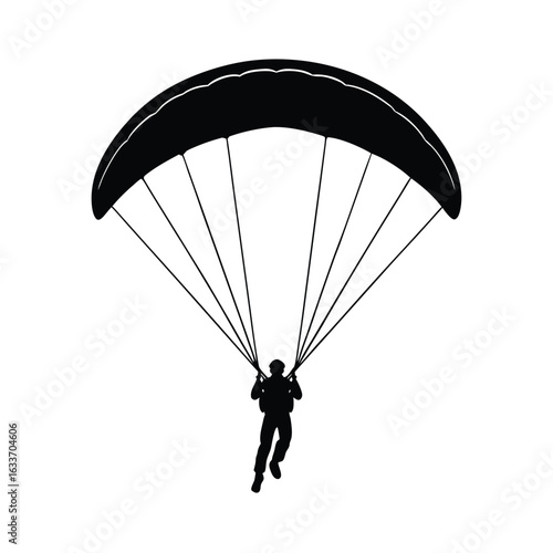 paraglider silhouette on the sky
