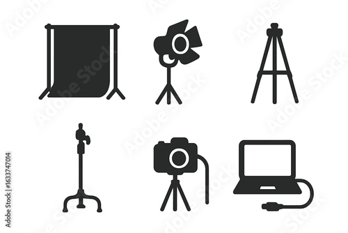 Studio Photography Equipment Icons Set. Solid Vector Silhouettes of Backdrop Frame, Studio Light, Camera Tripod, C-Stand, Tethered Laptop. Professional Photo Shoot Tools. Transparent Background