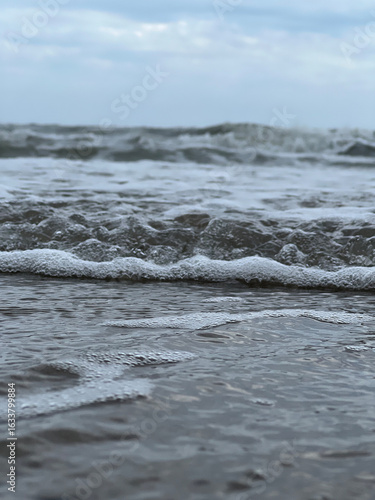 Fotografia Nahaufnahme von Meerschaum am Strand von Cavallino