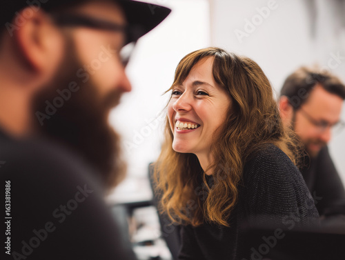 A DSLR photo with a cinematic feel, capturing a moment of laughter during a meeting. The background is pure white. The angle is candid and intimate, with great detail in full HD.