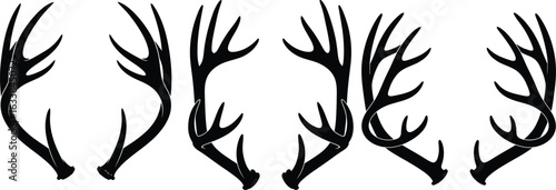 Collection of deer antlers in a stylized silhouette pattern
