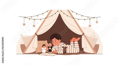Boy Enjoys Reading Book Inside Cozy Home Made Tent with Puppets