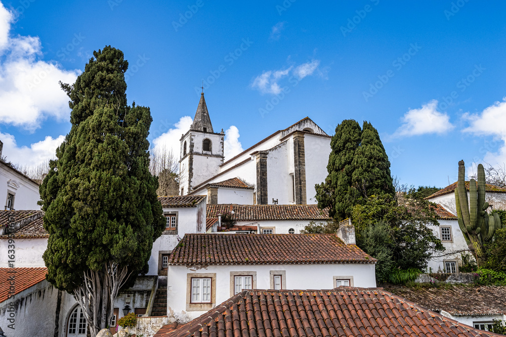 Obraz premium View of Obidos with renaissance Church of Saint Mary, Santa Maria at Obidos, Portugal