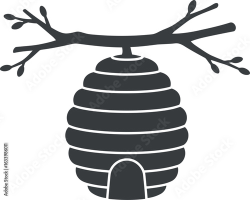 Rustic beehive on branch silhouette