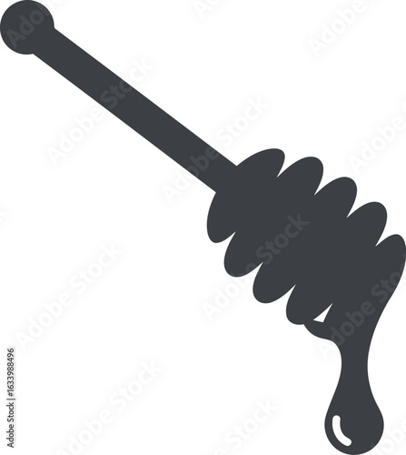 Honey dipper dripping sweet liquid