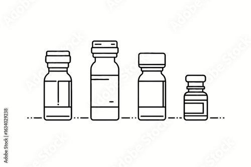 Brown medicine bottle and transparent salt and pepper shakers isolated on a white background