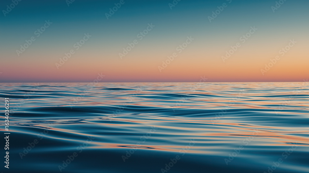 Obraz premium Peaceful ocean horizon at sunrise, soft colors and minimal waves