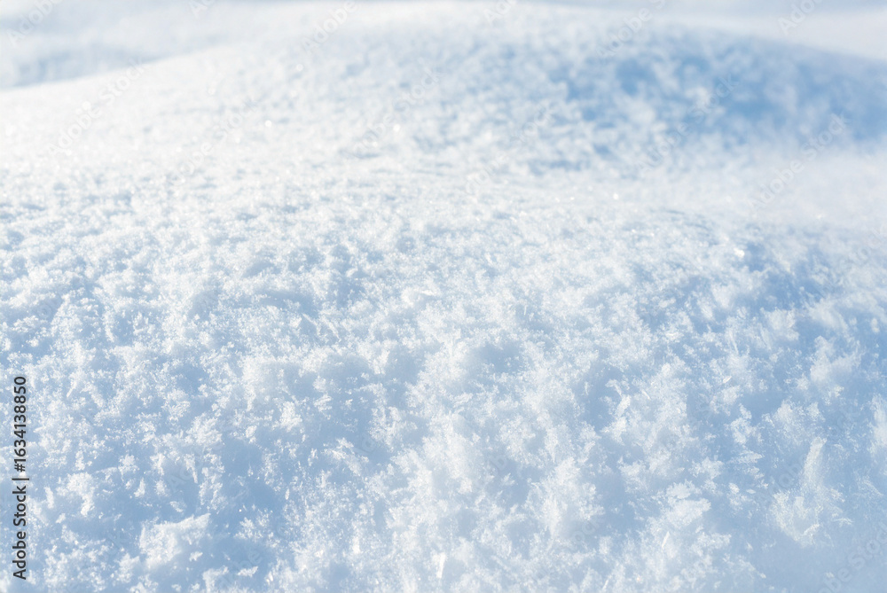 Obraz premium Texture of white snow in sunny weather. Winter background. White background. Light blue background