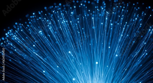 Radiant blue fiber optics glowing against a dark background