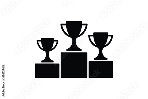 Three trophies on a podium celebrating victory