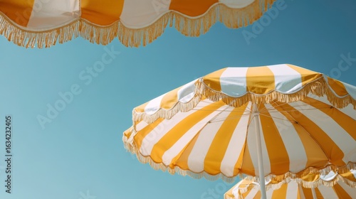 Yellow and White Umbrella on a Clear Day