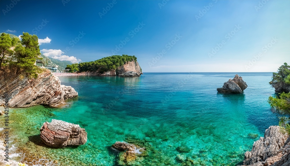 Fototapeta premium rocky bay landscape in petrovac montenegro showing vibrant nature and clear waters