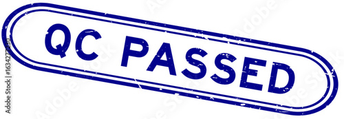 Grunge blue QC passed word rubber seal stamp on white background