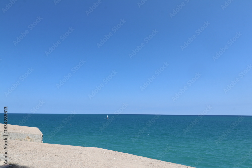 Fototapeta premium Blue Mediterranean Sea contrasting with the light blue of the sky