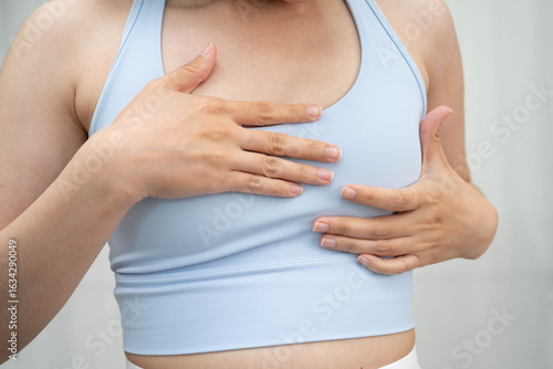Wallpaper Mural Asian woman self touching check lump or Breast cancer, Breast Self Exam. Torontodigital.ca
