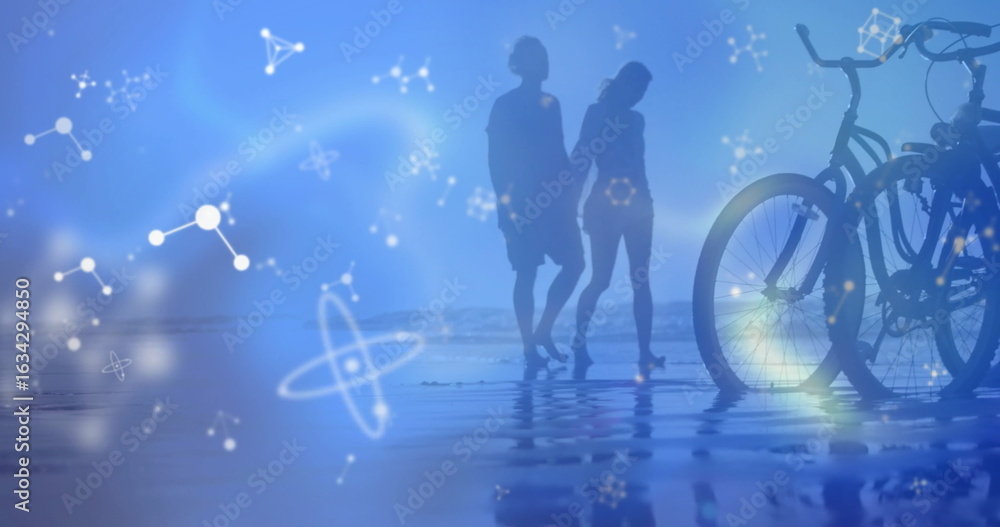 Fototapeta premium Walking silhouettes wearing shorts in shallow water at sandy beach, with bikes and network graphics