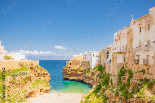 Fototapeta Naklejka Na Ścianę i Meble -  View of Polignano a Mare beach in Italy. Top tourist destinations in Italy. Trip to Europe.